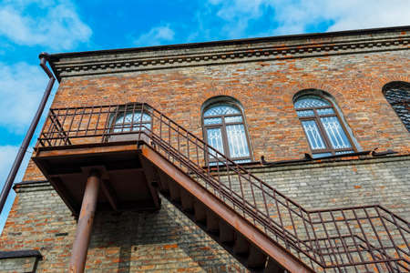Fragment of a historic red brick buildingの写真素材