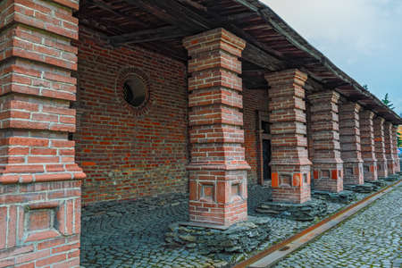 Fragment of a historic red brick buildingの写真素材
