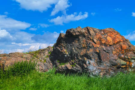 Summer landscape on the mountain against the sky and clouds. Summer mountain landscape.