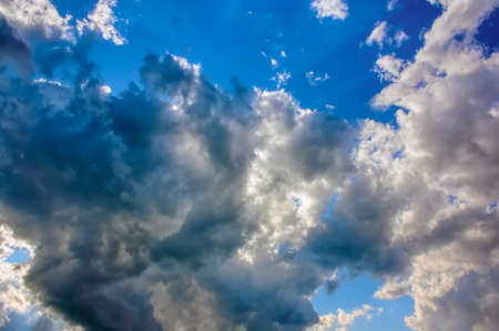 Abstract nature background. Dramatic and moody cloudy sunset skyの写真素材