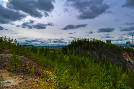 Top view of the large iron ore quarry Nizhny Tagil Russian Federation