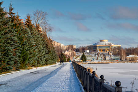 November 10, 2019 the first snow on the embankment of the city pond in Bondina Park Nizhny Tagil, Sverdlovsk region, Russia.のeditorial素材