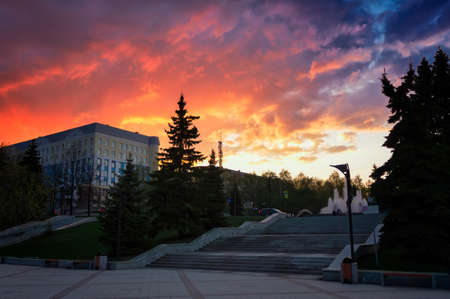 City evening. Sunset. Colorful sky and clouds. Summer city landscape.の写真素材