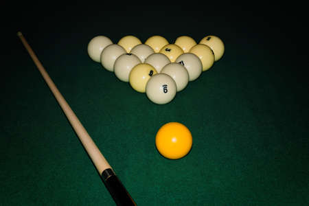 Billiard table close up. Billiards balls on green billiards table.