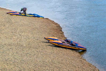 Water tourists in the process of assembling catamarans. View from above.の写真素材