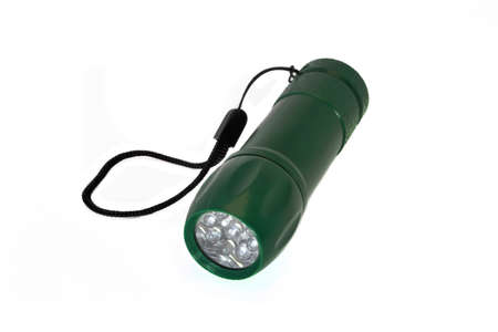 Portable LED flashlight green color isolate on a white background.