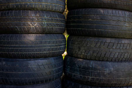 Old car tires close-up. Used car tires background.