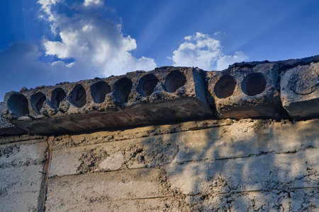 Close up of concrete plates surface. Concrete slabs with holes.