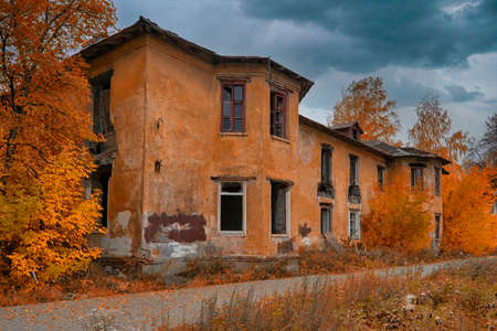 Old abandoned collapsing building. Landscape with the ruins of the old buildings.の写真素材