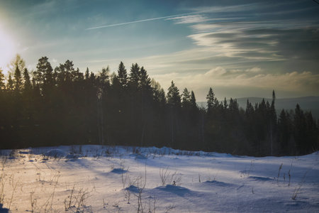 Fantastic winter landscape during sunset. Colorful sunset in the winter forest. beautiful winter landscape.の写真素材