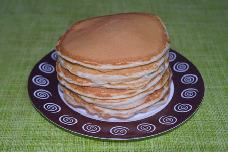 Homemade pancakes on a plate. Freshly baked homemade cakes.の写真素材