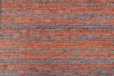 Close-up texture of the old red brick wall. Abstract close-up brick wall background.の写真素材