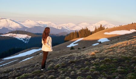 Shot of a woman admiring the view of mountains while hiking copyspace travel travelling tourism active sport nature calamity harmony idyllic landscapeの写真素材