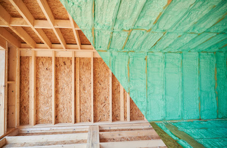 Photo collage before and after thermal insulation room in wooden frame house in Scandinavian style barn house. Comparison of walls sprayed by polyurethane foam. Construction and insulation concept.の写真素材