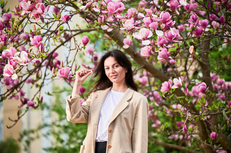 Woman allergic suffering from seasonal allergy at spring. Young happy woman showing allergy drugs,...
