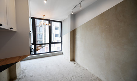 Comparison of old apartment and new flat with modern interior, parquet floor, table, chairs and white walls. Concept of home renovation. Empty room with large window before and after restoration.の写真素材
