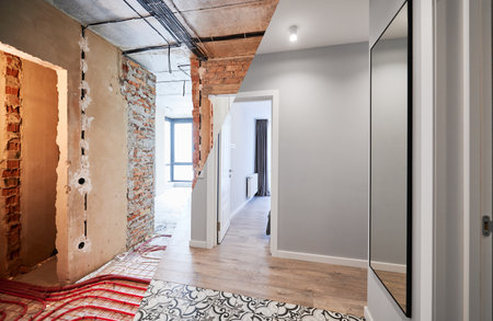 Comparison of old apartment before restoration and new renovated flat with modern interior design. Apartment before and after renovation.の写真素材