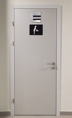 grey toilet doors for female genders in the airportの写真素材