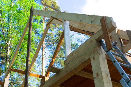 wooden roof construction in builsing area. Building ecological houseの写真素材