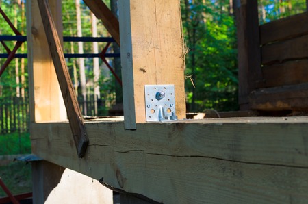 wooden roof construction in builsing area. Building ecological houseの写真素材