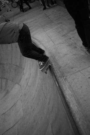 Grind by skateboard in closed sport park. Black and white picture with extreme concept.の写真素材