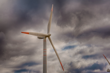 Wind Generator Turbines over Blue Sky - Green Renewable Energyの写真素材