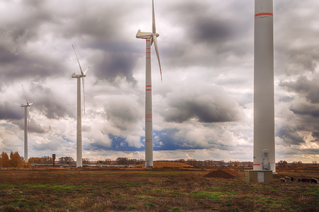 Wind Generator Turbines over Blue Sky - Green Renewable Energyの写真素材