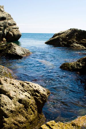 Sea tide between rocks, shot in Crimeaの写真素材