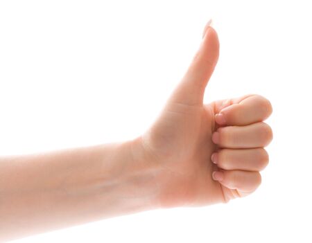 Thumb up gesture, isolated on white backgroundの写真素材