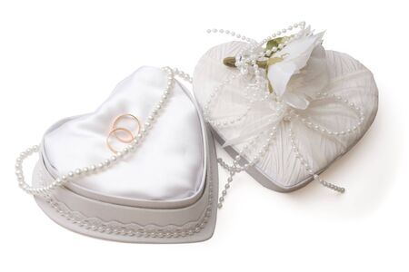 White wedding box with golden rings and pearl beads on white background, isolated, with clipping pathの写真素材