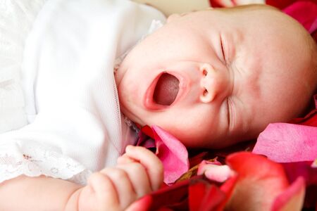 Baby yawningの写真素材