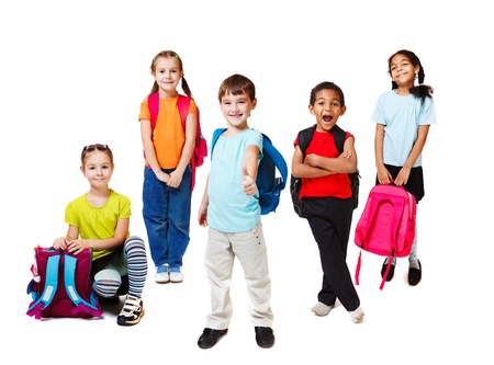 Primary school students with backpacksの写真素材