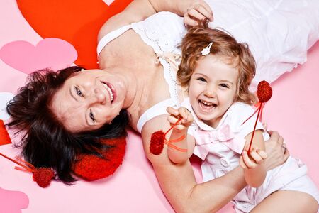 Granny and laughing little girl 