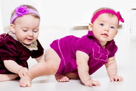 Two cute female toddlers playingの写真素材