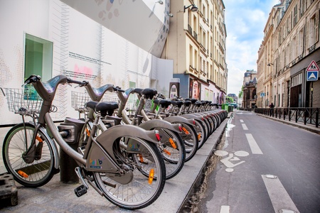 PARIS- MAY17: Rental bicycles on May 17, 2013  in Paris, France. Row of the gray city bikes for rent...