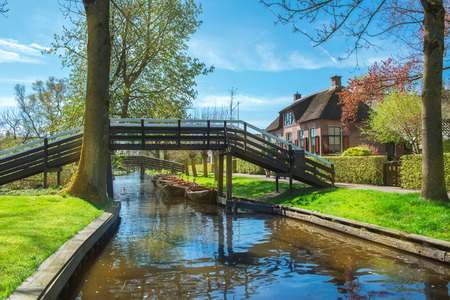 Giethoorn: a small village in the Netherlands. Often called Northern venice as central part of it has no car roads and certain houses accessible by boat onlyの写真素材