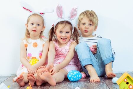Three smiling preschoolers with Easter bunny ears onの写真素材