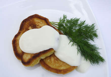 pancakes with sour cream and dillの写真素材