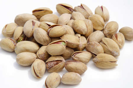 pistachioes insulated on white backgroundの写真素材