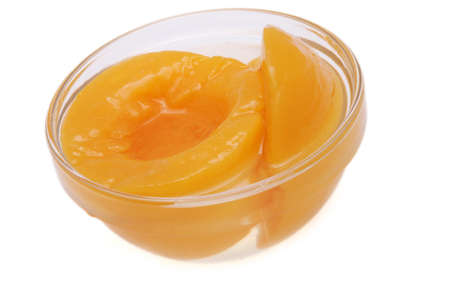 compote with peach  in glass chaliceの写真素材