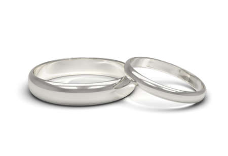 Two wedding rings. 3D generated image. White background.の写真素材