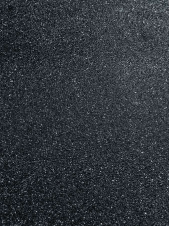 Texture dark wet asphalt after rain close-upの写真素材