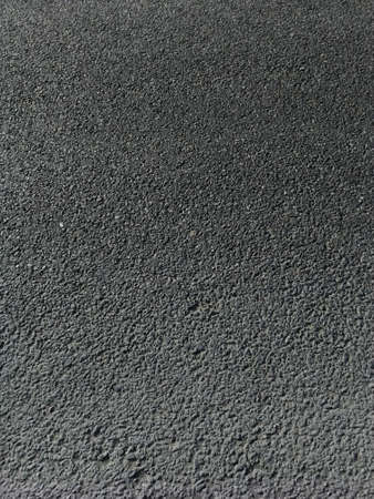 Texture of dry asphalt on the road.の写真素材