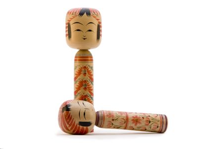 Japanese Kokeshi dolls photograph on white backgroundの写真素材