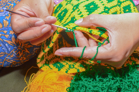 Crochet with green and yellow crochet thread.の写真素材