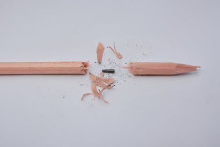 Broken pencil, close up of used pencil on white background with clipping path