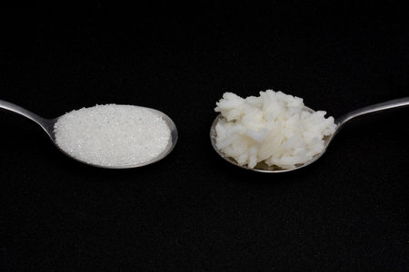 1 spoon of rice and 1 spoon of sugar Same amount of calories each day, two spoons, isolate black...