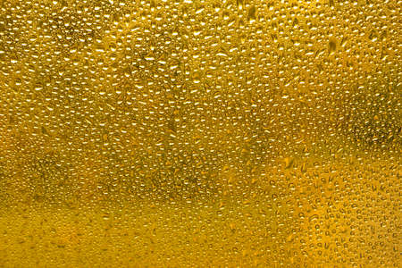 Gold water drops background textureの写真素材