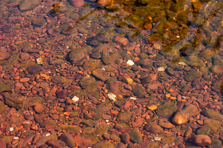 Rock stone in water, Transparent waterの写真素材