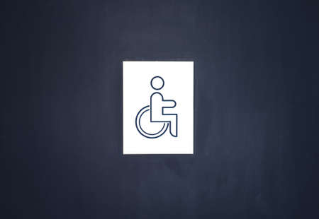 disabled sign toilet on doorの写真素材